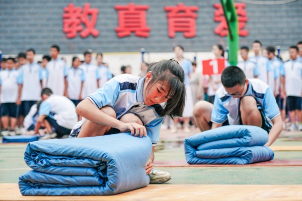 攀枝花市外国语学校举行初2024级新生入学适应性训练汇报表演(图2)